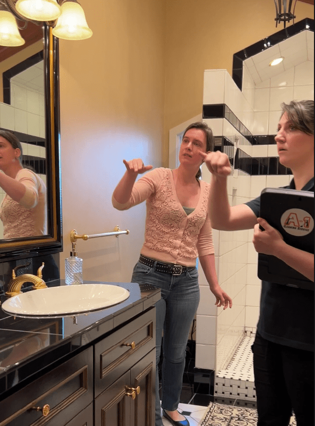 Professional maid service completing a bathroom cleaning in a home in Eureka, CA