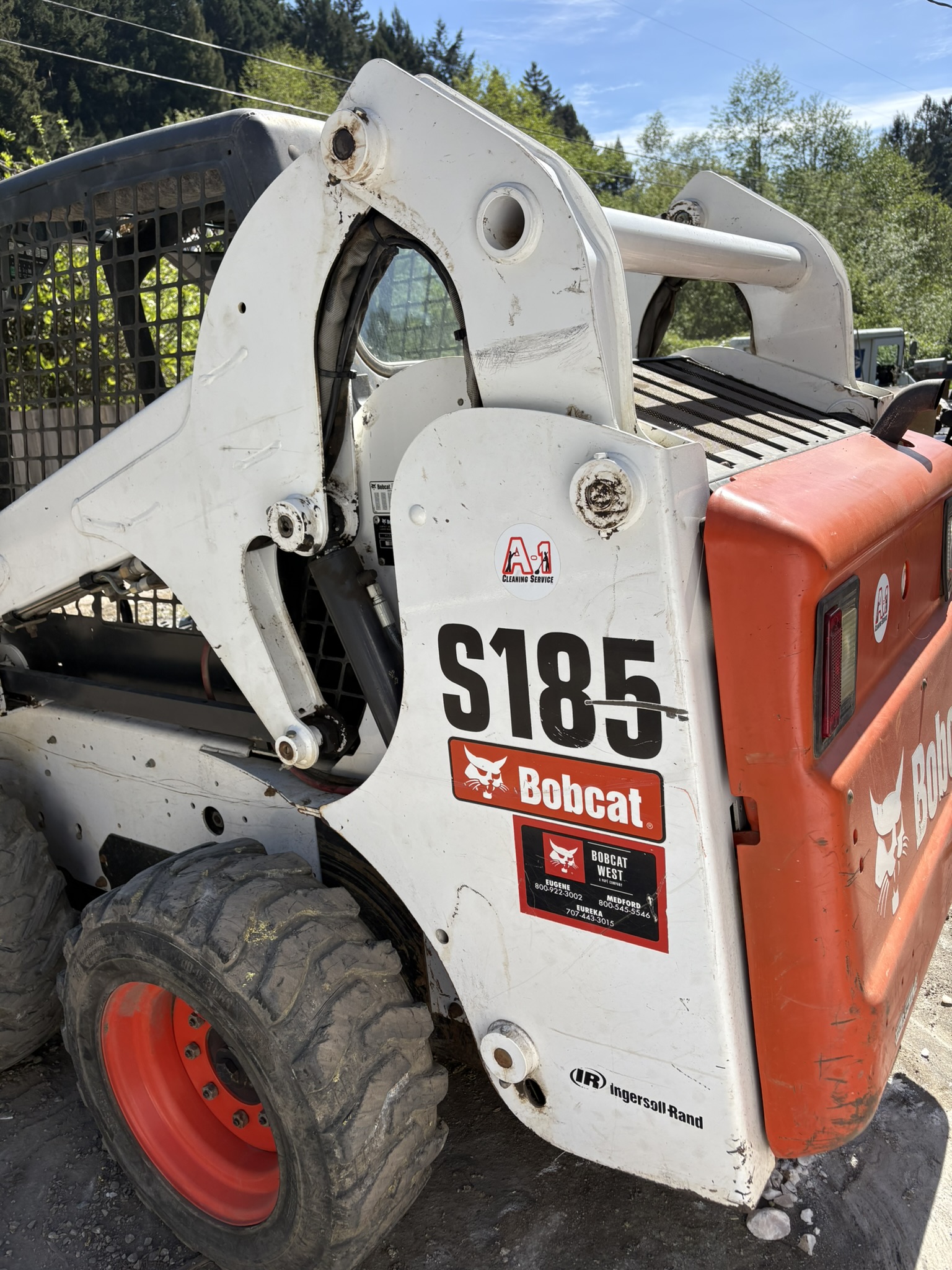Junk Removal Services in Eureka, CA shown after a large cleanout project using a skid steer